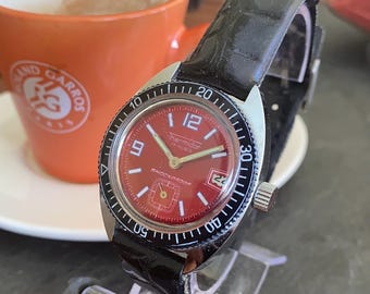 Thermidor Taucheruhr aus den 1970er Jahren: Karmesinrotes Zifferblatt, mechanisches Uhrwerk