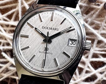 1980s Dolmaru Swiss Automatic - Rare Silver Linen Dial 36mm