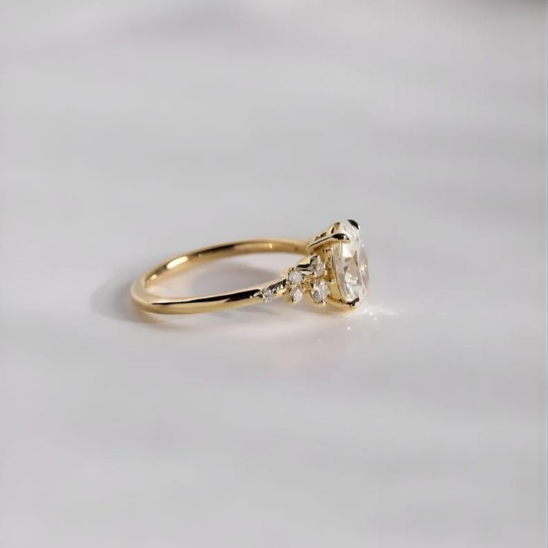 Oval Diamond Ring with delicate botanical design.