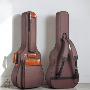 May include: A set of three ceramic mugs with a speckled, matte finish in cream, light grey, and dark grey. Each mug has a simple, minimalist design, suitable for coffee or tea.