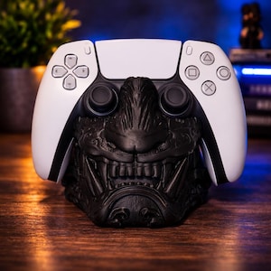 May include: A set of three ceramic mugs with a speckled, matte finish. The mugs are in shades of cream, light gray, and dark gray. Each mug has a simple, minimalist design and a rounded handle.