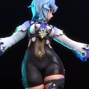 May include: A detailed figurine of a character with light blue hair and a complex outfit. The figure is wearing a white and black top with gold accents, black shorts, and a blue and gold emblem. The pose is dynamic, with arms outstretched.