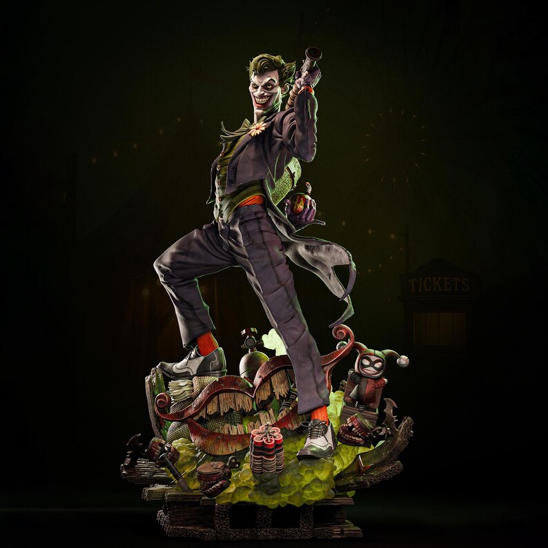 May include: A detailed statue of the Joker, a DC Comics supervillain, in a dynamic pose. He wears a purple suit, green hair, and a sinister grin. The base features a carnival theme with Harley Quinn and other elements. The statue is approximately 15 inches tall.