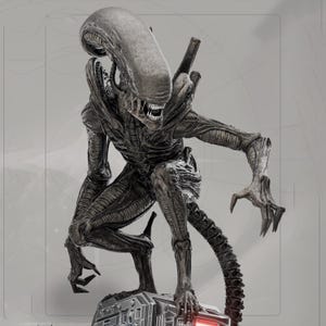 May include: A detailed, gray Alien Xenomorph statue, crouched with its arms outstretched. The creature has a long, smooth head, sharp teeth, and a segmented tail. It is posed on a metallic base with a red light.