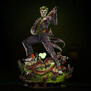 May include: A detailed statue of the Joker, a DC Comics villain, in a dynamic pose. He wears a purple suit, green vest, and orange socks. The base features a chaotic, colorful design with a grinning mouth and other thematic elements.