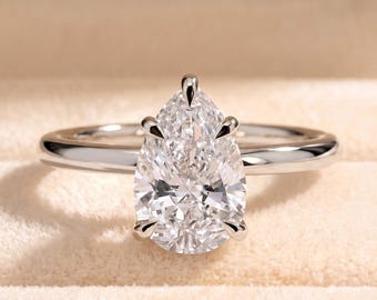 Anello di fidanzamento solitario con taglio a goccia, diamante sintetico da 2 carati, montatura a 5 griffe, design minimalista, oro.