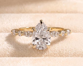 Anello di fidanzamento con taglio a goccia, diamante sintetico da 2 carati, pietre d'accento a marquise e rotonde, anello solitario in oro per proposta di matrimonio.