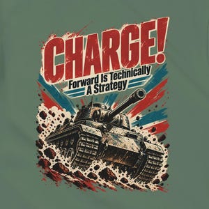 May include: An olive green t-shirt featuring a graphic print of a military tank moving through debris. The text "CHARGE! Forward Is Technically A Strategy" is printed above the tank in red and black against a blue and red background design.