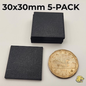 May include: Black square coasters, 30x30mm, with a textured surface. The image shows a stack of coasters, a single coaster, and a Canadian dollar coin for size comparison. The text "30x30mm 5-PACK" is at the top.