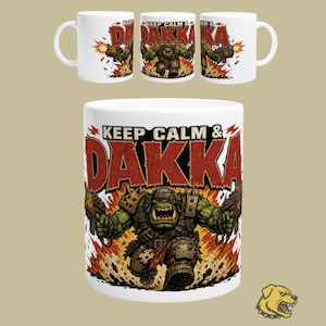 May include: A white ceramic mug featuring a graphic of a green orc character holding two guns with the text "KEEP CALM & DAKKA" in large red letters above the figure. The design includes orange explosion effects and flying shell casings.