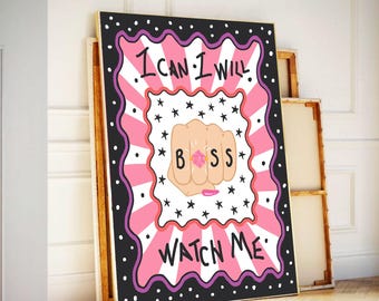 May include: A framed art print with the words "I CAN I WILL WATCH ME" in a bold, playful font. The artwork features a fist with the word "BOSS" tattooed on the knuckles, surrounded by stars and a pink and white color scheme.