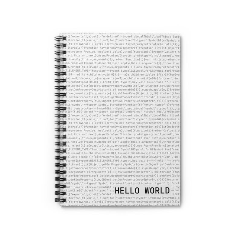 Front view of minimalist white spiral notebook with programming code texture and ‘Hello World’ text.