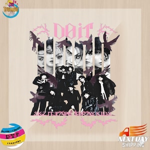 May include: A DTF (Direct to Film) transfer featuring a group of people with the text "Do it" in pink, and the text "SKZ IT TAP STRAY KIDS" in pink. The image has a light wood grain background and includes pink bat-like shapes.