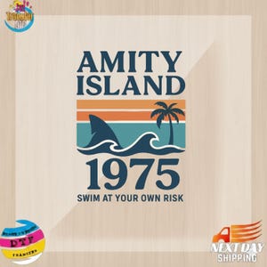May include: A graphic design featuring the text "AMITY ISLAND 1975" with a shark fin, waves, and a palm tree. The design includes the phrase "SWIM AT YOUR OWN RISK" in a retro style, with orange, teal, and blue colors.