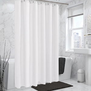 May include: A solid white shower curtain featuring a series of evenly spaced metal grommets along the top edge, suspended from a horizontal metal rod. The curtain hangs in vertical folds, creating a clean and uniform appearance across the length.