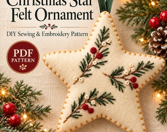 May include: A cream-colored star-shaped felt ornament featuring embroidered green pine sprigs and red berries, suspended by a dark green ribbon. The text reads Christmas Star Felt Ornament DIY Sewing & Embroidery Pattern PDF PATTERN.