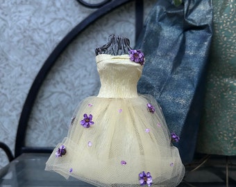 Drisella - Purple flowers yellow paper dress on wire frame 6”