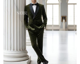 May include: A dark olive green velvet double-breasted suit with a black satin lapel. The suit includes a matching jacket and trousers, paired with a white dress shirt, black bow tie, and black leather shoes. The word "NOIR" is printed on the left side.