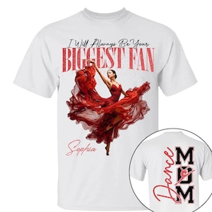 May include: White t-shirt featuring a dancer in a red dress with the text "I Will Always Be Your Biggest Fan" in red. The name "Sophia" is written below the dancer. A smaller image shows "Dance Mom" in red.