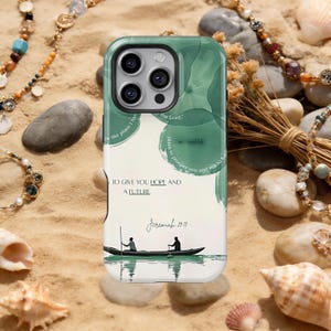 May include: A phone case with a green and white design featuring the text "TO GIVE YOU HOPE AND A FUTURE" and "Jeremiah 29:11". The case has a watercolor-style design with a boat illustration.