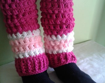 Pink and white crochet leg warmers.