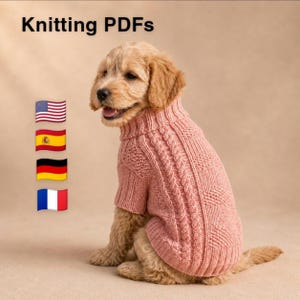 May include: A light pink knitted dog sweater with a cable knit pattern and a high turtleneck collar. The text "Knitting PDFs" appears in the upper left corner, accompanied by four small flag icons representing the United States, Spain, Germany, and France.