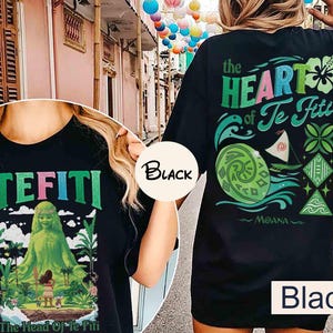 May include: Black t-shirts with graphics from the animated film Moana. One shirt features the text "TEFITI" with an image of Te Fiti. The other shirt has "the HEART of Te Fiti" with Moana-themed illustrations.