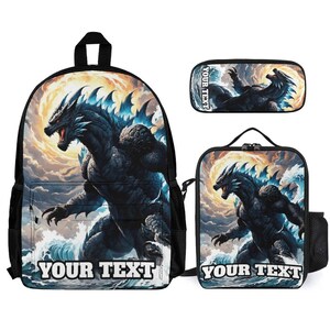 May include: A backpack, a lunch bag, and a pencil case set featuring a dark, scaly monster with blue glowing spikes emerging from ocean waves against a swirling golden sky. Each item displays the text YOUR TEXT in bold white capital letters.