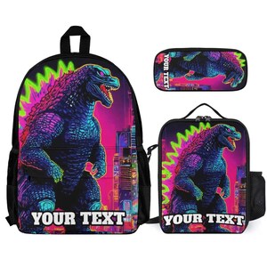 May include: A black backpack, lunch bag, and pencil case set featuring a neon-colored monster graphic against a city skyline. Each item displays the text YOUR TEXT in white block letters. The monster has purple, blue, and green scales.