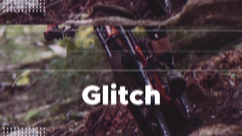 May include: A mountain bike with red and black detailing is seen in motion on a dirt track. The word "Glitch" is displayed in white, stylized text across the image, suggesting a digital or technical theme.