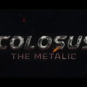 May include: A dark background with the word "COLOSUS" in a metallic, chrome-like font. Below, the text "THE METALLIC" is displayed. The upper right corner features a purple and pink "Pr" logo.