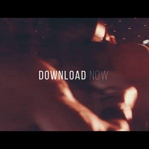 May include: A dimly lit image with the text "DOWNLOAD NOW" in white capital letters. The background is a blurred, reddish-brown with a suggestion of a person or figure. The overall aesthetic is dark and dramatic.