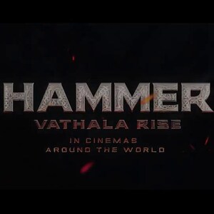 May include: Dark background with the word "HAMMER" in a textured, metallic font. Below, "VATHALA RISE" is displayed, followed by "IN CINEMAS AROUND THE WORLD." A small Adobe Premiere Pro logo is in the upper right corner.