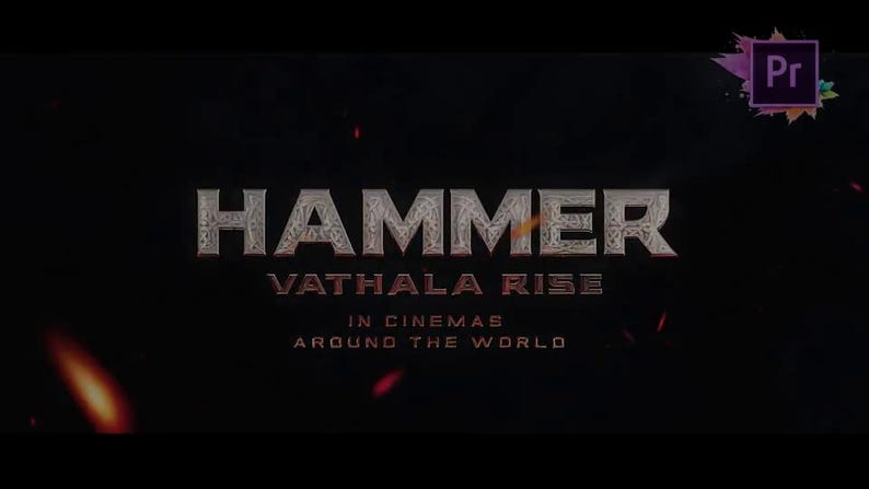 May include: Dark background with the word "HAMMER" in a textured, metallic font. Below, "VATHALA RISE" is displayed, followed by "IN CINEMAS AROUND THE WORLD." A small Adobe Premiere Pro logo is in the upper right corner.