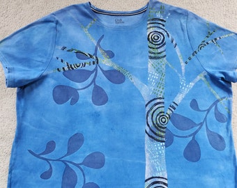 Freezer paper cutout & thermo fax screens used to create a unique tree and leaf motif, woman's 3XL t-shirt, dyed and printed, mostly blue