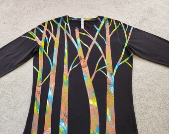 Unique discharged, trees with printed leaves, X's and O's, pocket watch, blue grid and splashes of color, woman's XL long sleeve t-shirt