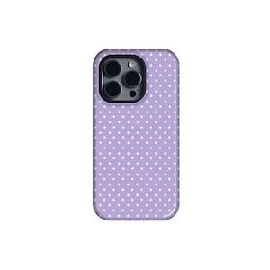 May include: A lavender phone case with a white polka dot pattern. The case has a camera cutout and is designed to fit a smartphone. The case is made of a smooth material and has rounded edges.