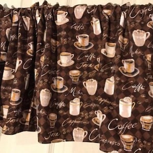 May include: Brown valance with a repeating pattern of coffee cups, coffee beans, and coffee-related words like "Caffe" and "Latte" in white script. The background is a brown and tan checkered pattern.