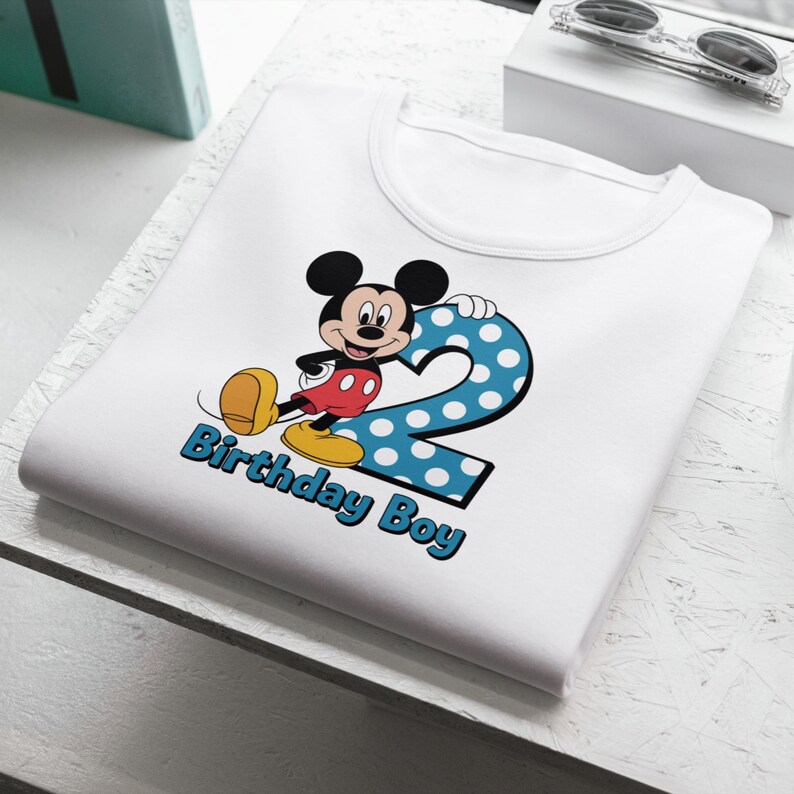 Personalized boy PNG birthday design with custom name and number, featuring blue polka dot style and cartoon theme, perfect for birthday shirt PNG and custom shirt PNG projects,this birthday number PNG is ideal for kids birthday PNG crafts, sublimation printing and DIY party outfits, high resolution transparent background file for creating unique birthday boy celebration designs,kids birthday png,mickey mouse custom birthday png,toddler png,png for cricut submilition,birthday t shirt png designs