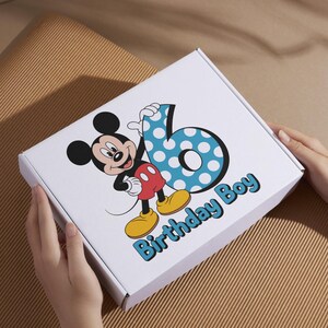 Custom birthday PNG for boys with personalized name and age number in blue polka dot theme,perfect birthday boy PNG for birthday shirt PNG and kids birthday PNG use,this cartoon birthday PNG is ideal for 1st birthday boy outfits, DIY crafts, sublimation and print projects, high quality transparent background file ensures smooth design application for custom shirt PNG creations,custom birthday shirt,kids birthday shirt design,cartoon birthday png,birthday boy png,transparent png,kids birthday png