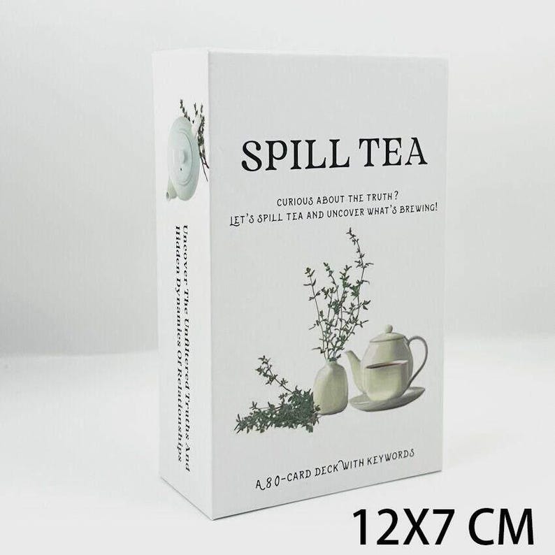May include: A white card deck titled "SPILL TEA" with text: "Curious about the truth? Let's spill tea and uncover what's brewing!" and "A 80-card deck with keywords." The box measures 12x7 cm.