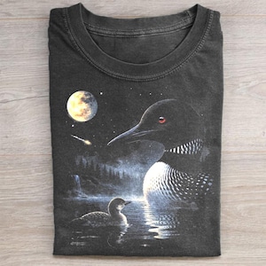 Loon Moon Shirt, Vintage Wildlife Graphic Tee, Cosmic Bird Nature Apparel, Mysterious Night Lake Top, Bird Lover Gift, Retro Animal Shirt immagine 1