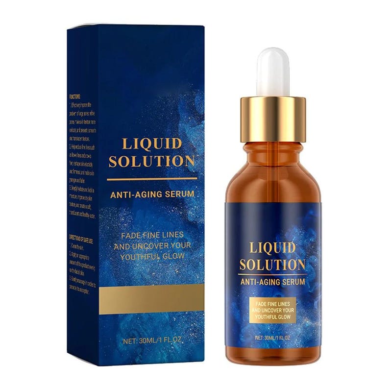 May include: A brown glass bottle with a gold cap and a blue label, next to a matching box. The label and box read "LIQUID SOLUTION ANTI-AGING SERUM" and "FADE FINE LINES AND UNCOVER YOUR YOUTHFUL GLOW". The bottle contains 30 ml.