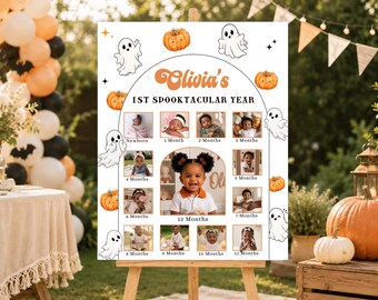 May include: A white milestone sign featuring the text Olivia's 1ST SPOOKTACULAR YEAR, decorated with orange pumpkin and white ghost illustrations. The board displays twelve individual photographs documenting monthly growth from newborn to 12 months.