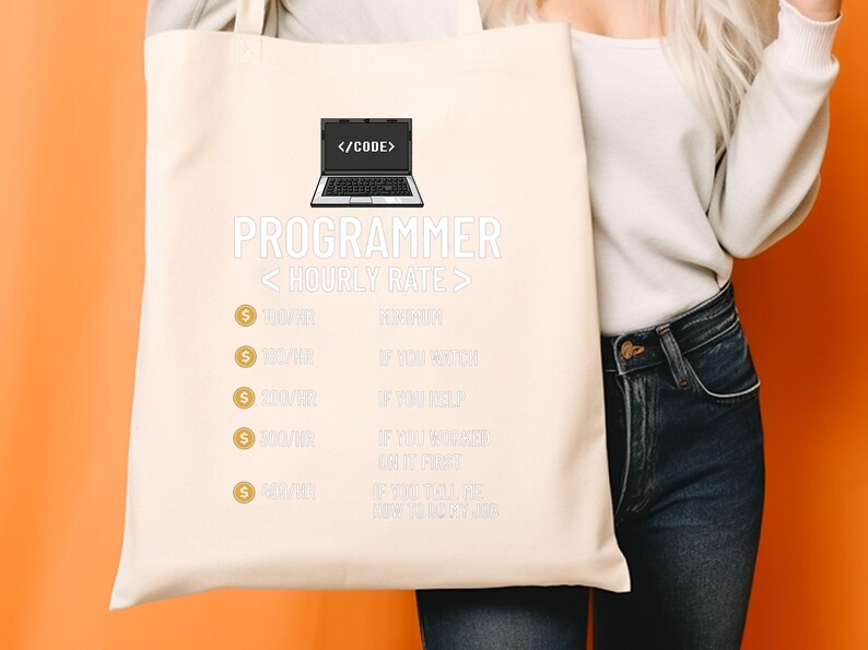 May include: A cream tote bag with the word "PROGRAMMER" in white. The bag has a laptop graphic and text about hourly rates. The text includes phrases like "If you need" and "If you tell me".