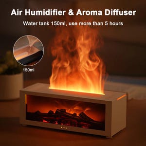 Peut inclure: Un humidificateur d'air et diffuseur d'arômes blanc avec un effet de flamme. L'appareil a une capacité de réservoir d'eau de 150 ml et peut être utilisé pendant plus de 5 heures. Le texte "Air Humidifier & Aroma Diffuser" est affiché en haut.