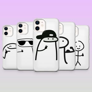 May include: Five white phone cases with black and white cartoon character designs. The designs include characters with sunglasses, a hat, and various hand gestures. The cases are arranged in a row, with a lilac background.