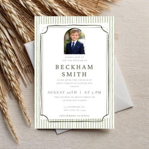 May include: Baptism invitation featuring a photo of a young boy in a suit. The invitation has a green and white striped background and includes the name "Beckham Smith" and event details. The text reads "Kindly join us for the baptism of..."
