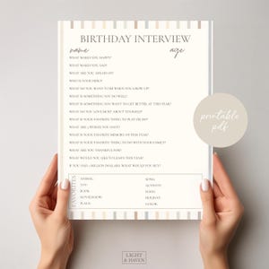 Könnte beinhalten: Ein druckbares PDF-Geburtstagsinterview-Blatt mit neutralem Farbschema. Das Blatt enthält Aufforderungen für das Kind, Fragen zu seinen Lieblingsdingen, Wünschen und Erinnerungen zu beantworten. Die Wörter "BIRTHDAY INTERVIEW" und "printable pdf" sind sichtbar.