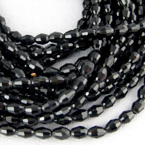Chinese Crystal Beads - Black Chinese Crystal Faceted Rice Beads - 1 STRAND (S94B10-04)